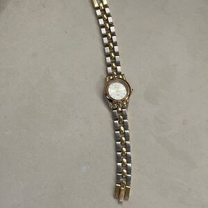 Anne Klein designer watch with 9 interchangeable face plates.